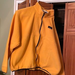 Very nice fleece jacket with pockets very warm can be used as a liner too!